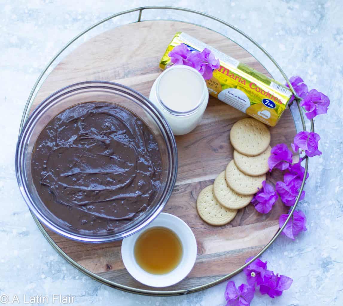 Chocolate marquesa pudding and maria crackers for cake assembly with Bougainvillea flowers
