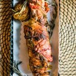 chipotle-Bacon-Wrapped-Pork-Tenderloin-served-on-rectangular-dish