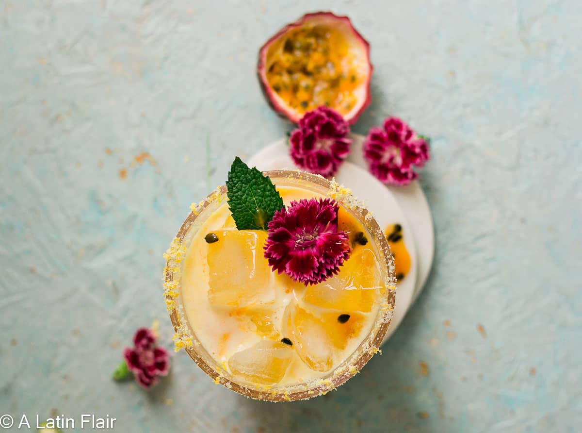 Skinny-Passion-Fruit-Margarita-Cocktail-garnished-with-flowers