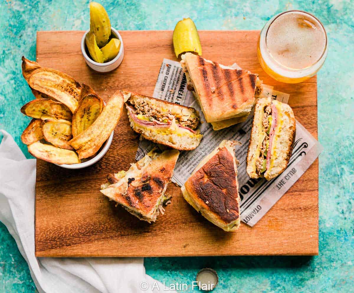 11-Cubano-Sandwich-on-a-wood-board-and-plantain-chips