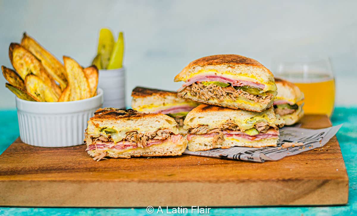 11-Cubano-Sandwich-on-a-wood-board-and-plantain-chips