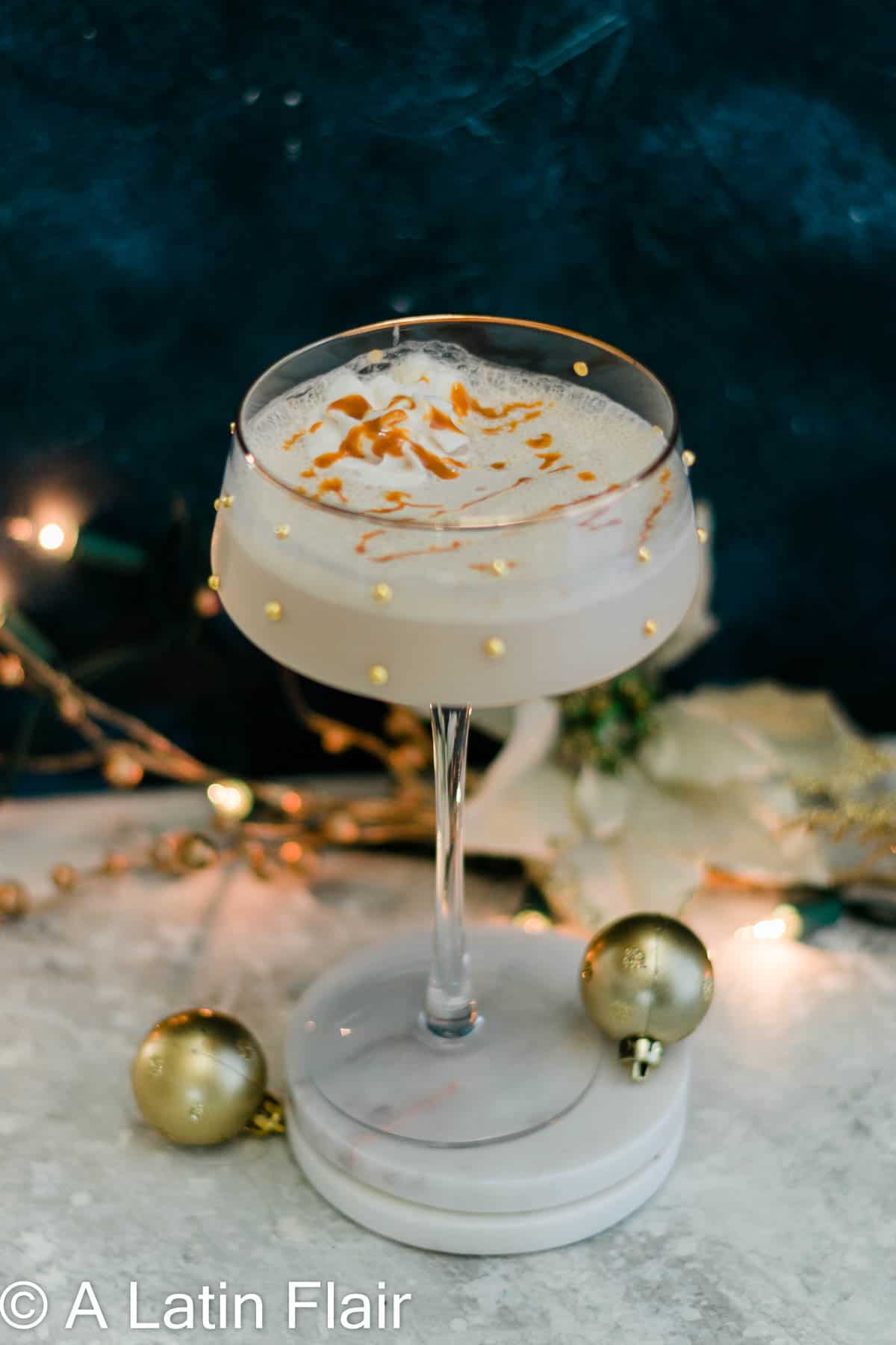 festive-Dulce-de-Leche-Martini-Cocktail-with-Rum-with-navy-blue-background-3