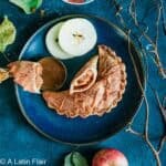 Dulce de Leche and Apple Empanadas served on blue plate