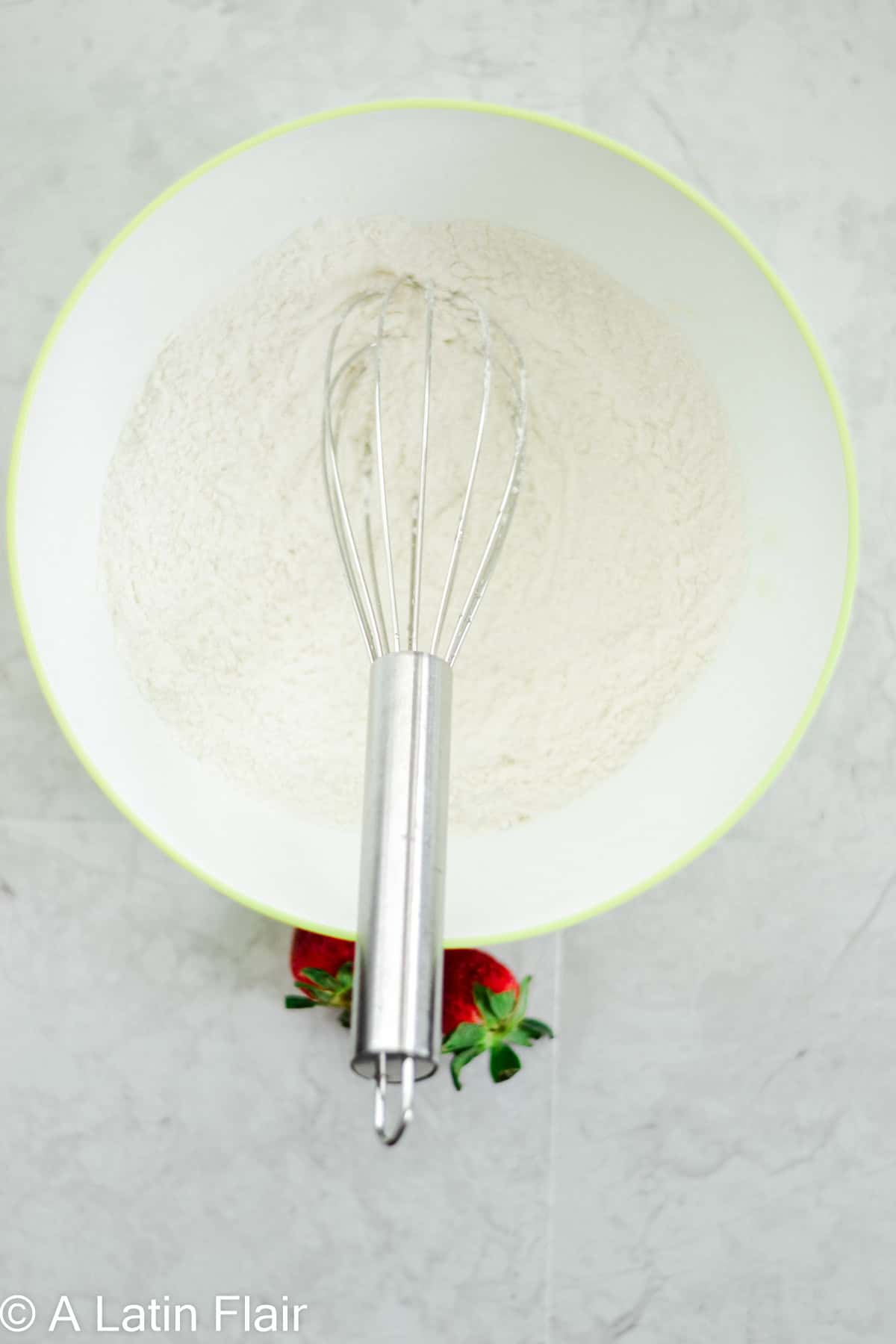 mixing dry ingredients for Tres Leches cake batter