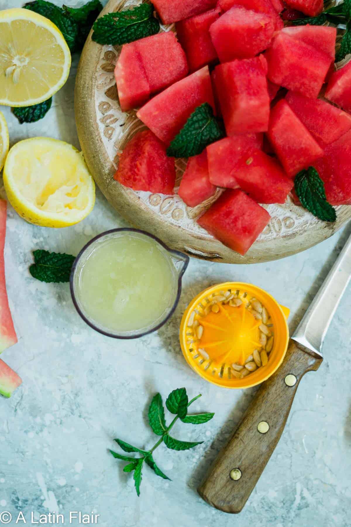 juiced lemons and cut up watermelon cubes for watermelon Agua Fresca