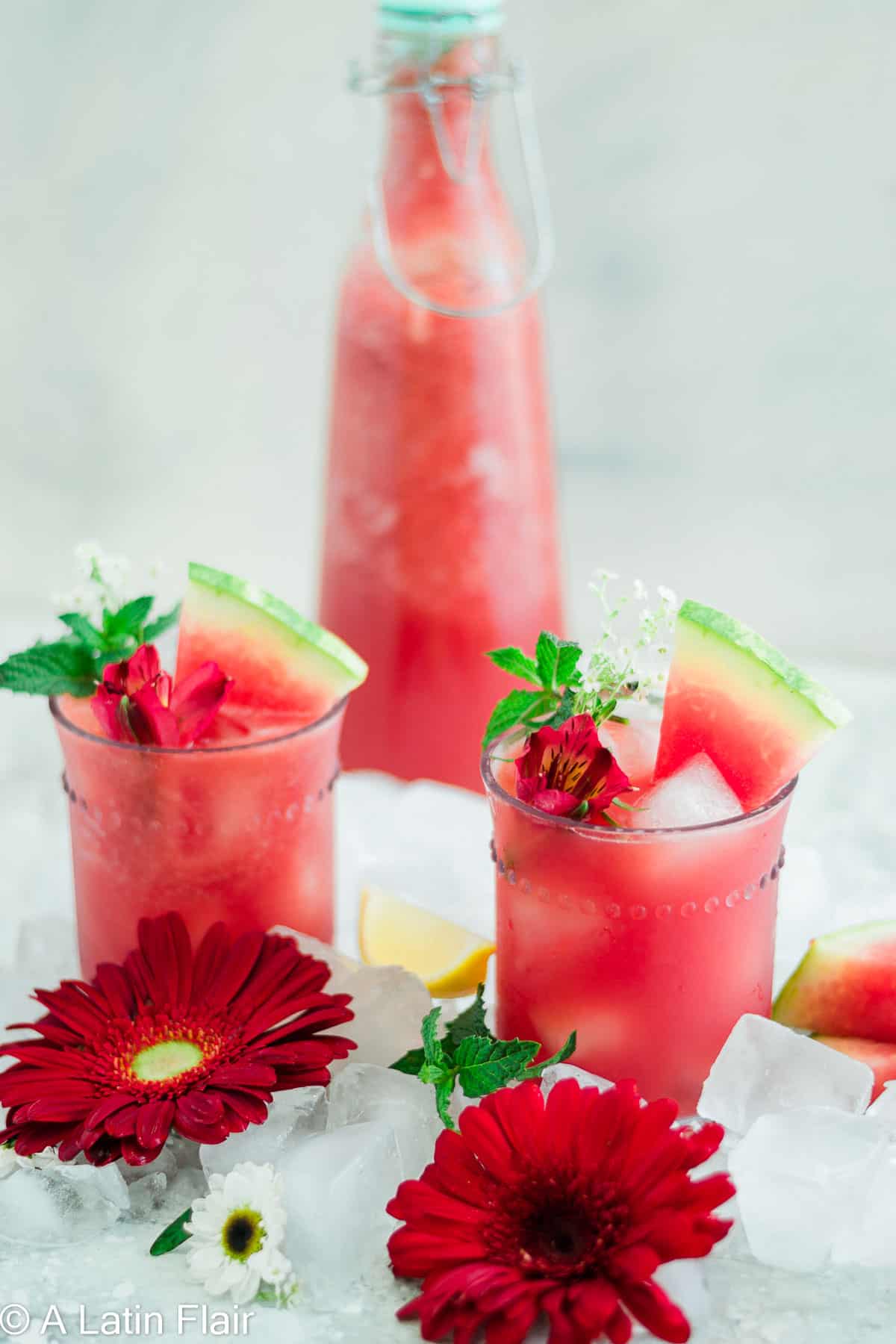 Watermelon Agua Fresca (watermelon juice) served in glasses with white background
