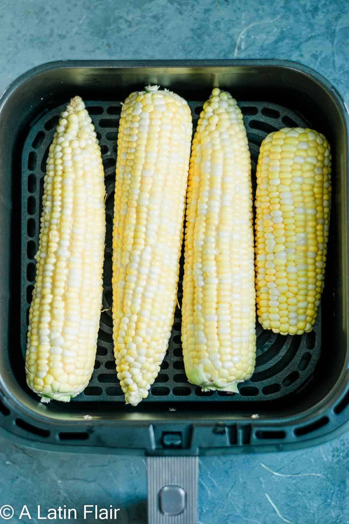 corn cobs inside air fryer for Elote Air Fryer 