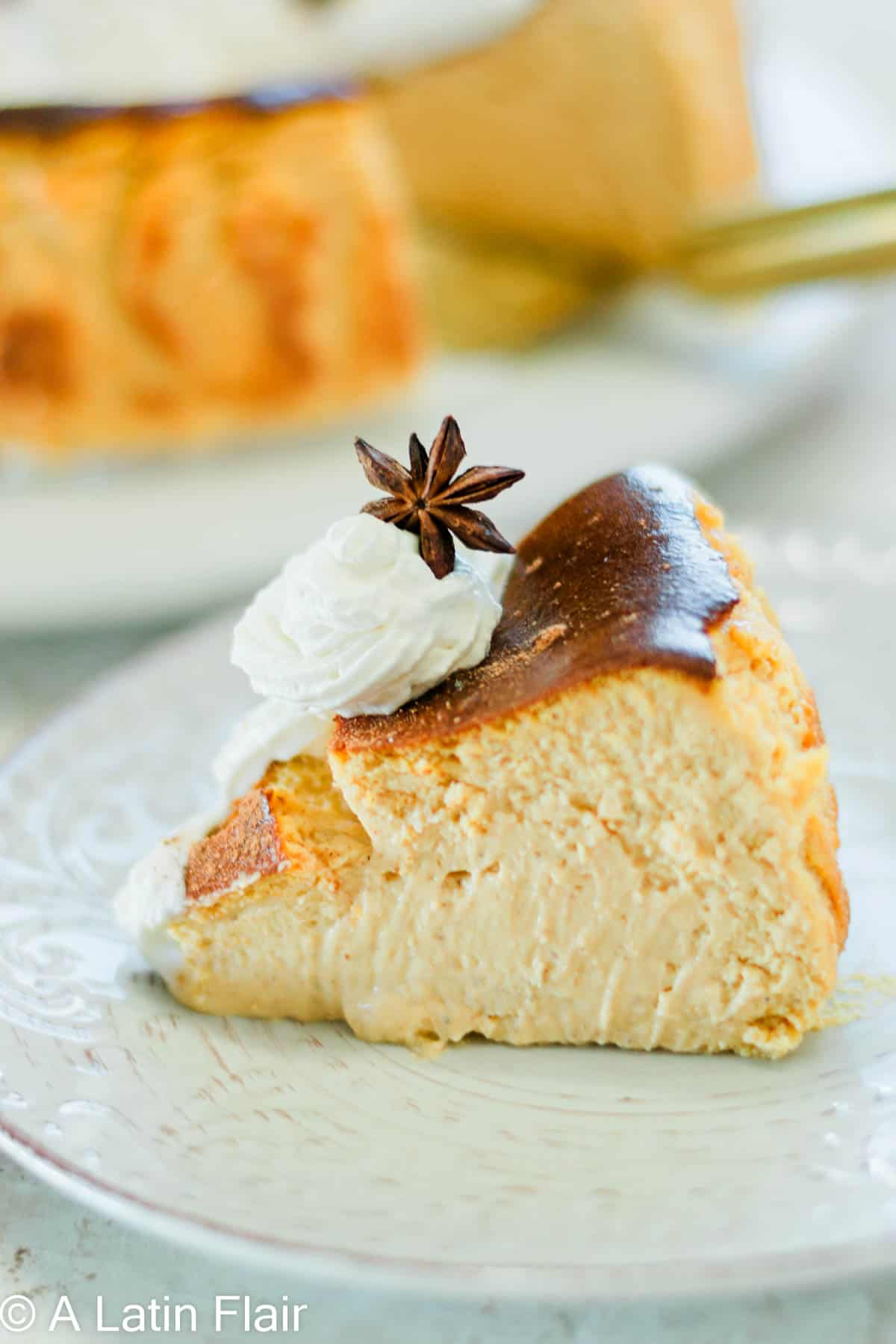 slice of pumpkin basque cheesecake on a plate
