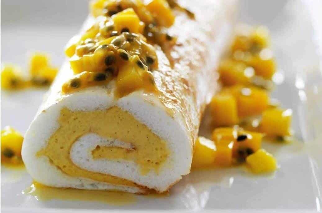 Mango and passionfruit meringue roulade.