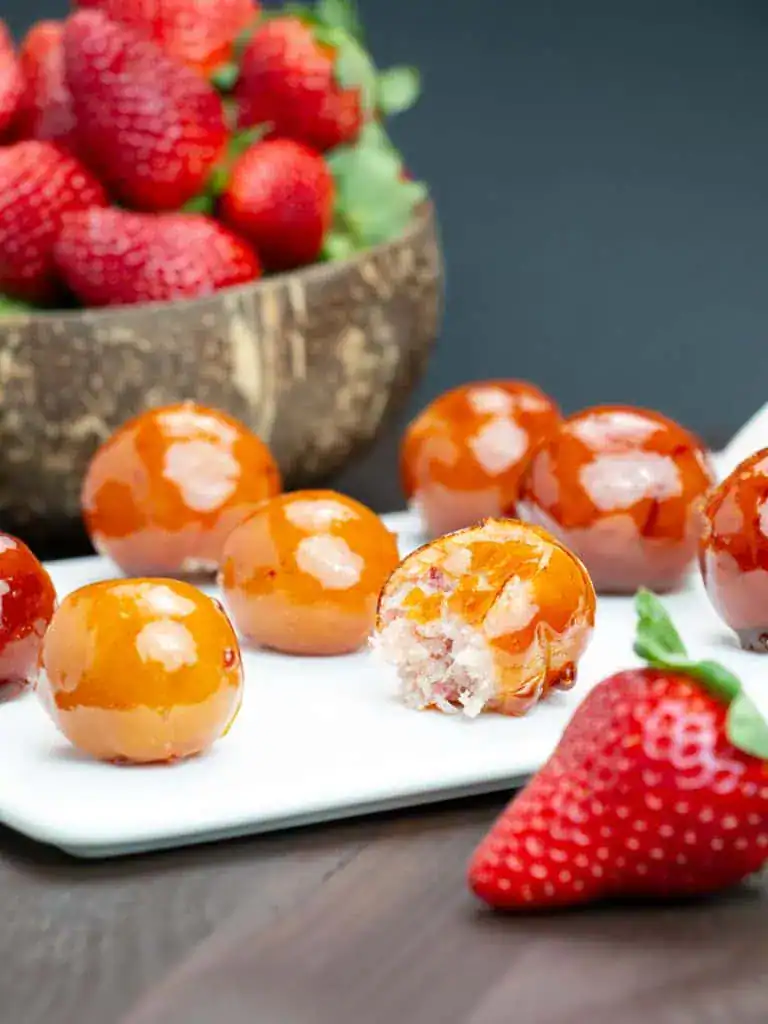 Brazilian coconut bonbon bala baiana with strawberry.